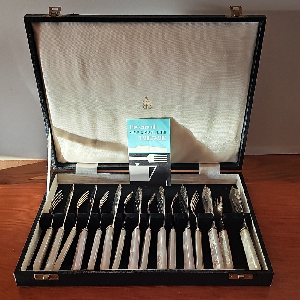 Elegant Silverware Set with Pearl Handles
